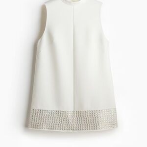 Sleeveless White Dress with Silver Embellishments